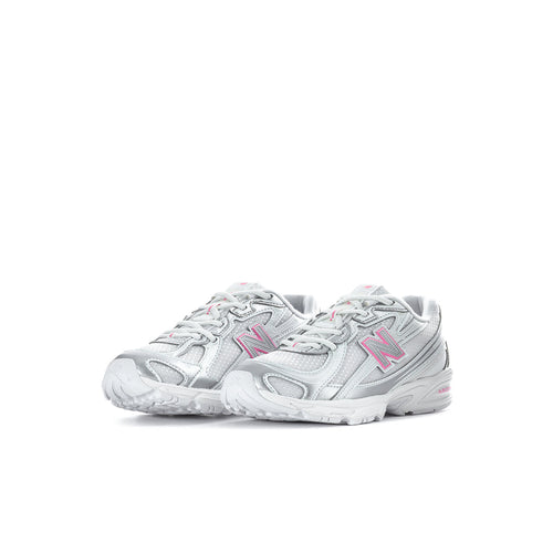Kids running sneakers, silver metallic with magenta N logo, lace-up side view