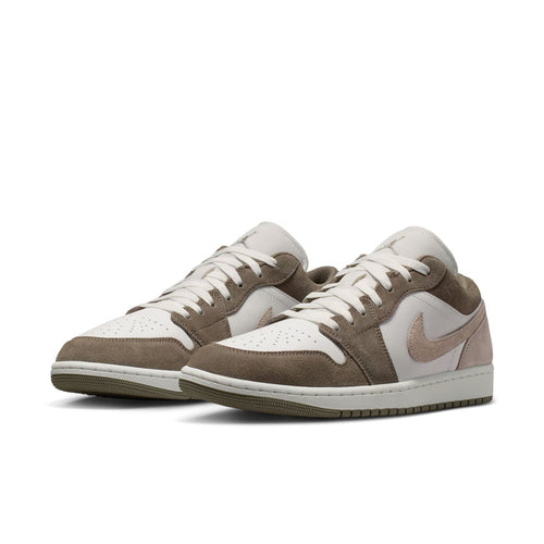Men's low-top sneakers pair in brown suede and white leather with lace-up design