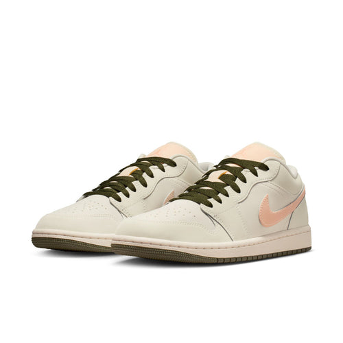 Women's low-top sneaker, off-white leather upper with pink Nike swoosh and olive laces