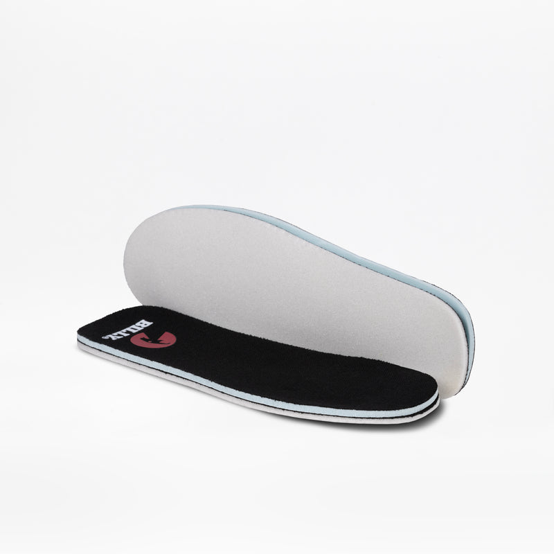 A pair of BILLY Footwear Black to the Floor BILLY CS High insoles is displayed: one with a black top and white logo lies flat, while the other is propped up, showing its white underside on a plain white background.