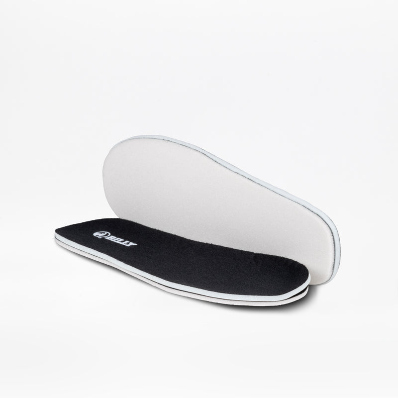 A pair of Black to the Floor BILLY Sport Inclusion insoles by BILLY Footwear are shown, with one displaying the black cushioned top and the other revealing the white underside, designed for athletic zipper shoes or kids sneakers.
