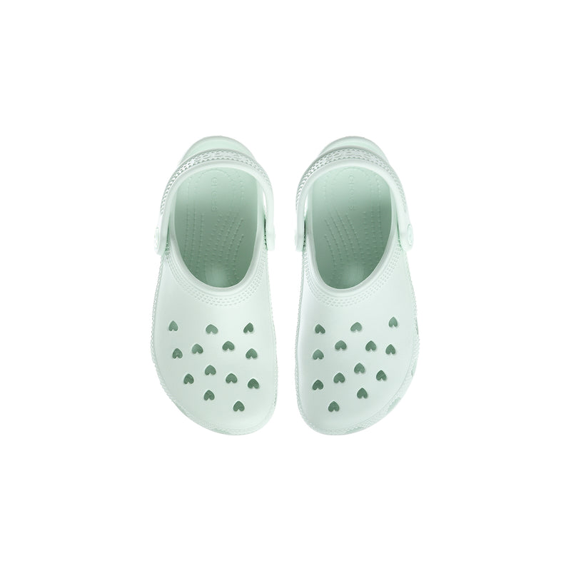 Kids' white clog shoes with sage dots, perforations, and back strap