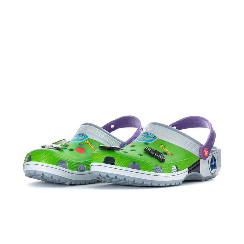 Men's classic clog angled view with green upper, purple strap, and gray outsole