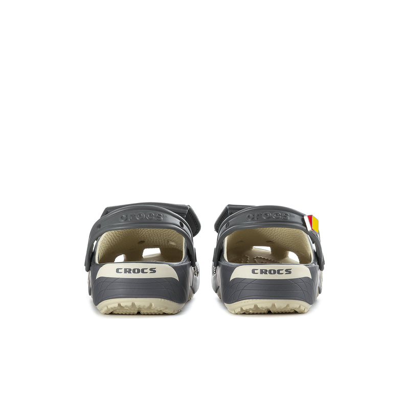 Men's clog heel view in dark gray with back strap, vent holes, and light sole