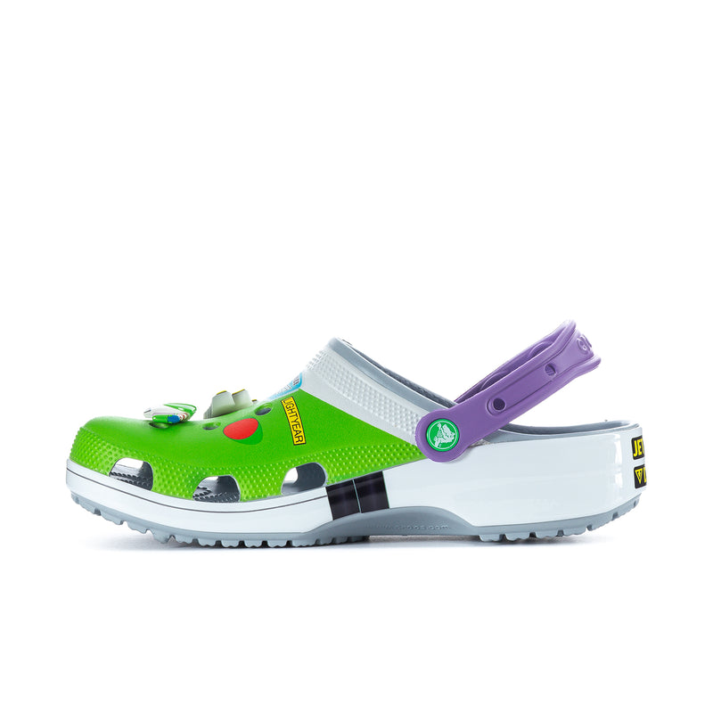 Men's classic clog side view in green with purple strap and white top