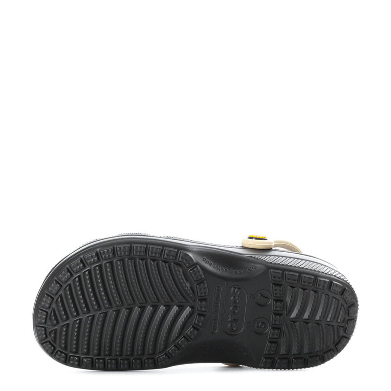 Black clog outsole with textured tread and logo marks