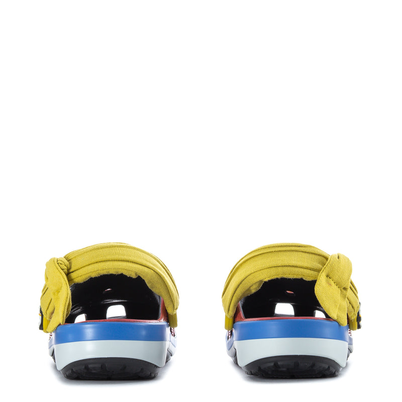 Youth clogs back view with yellow heel straps, pink/red uppers, and blue midsole