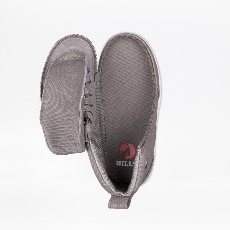 The Dark Grey BILLY Classic D|R II High by BILLY Footwear is a kids’ orthopedic shoe with a wide side flap, revealing the interior and red logo insole. Displayed on a white background, this adaptive AFO-friendly footwear offers support and comfort.