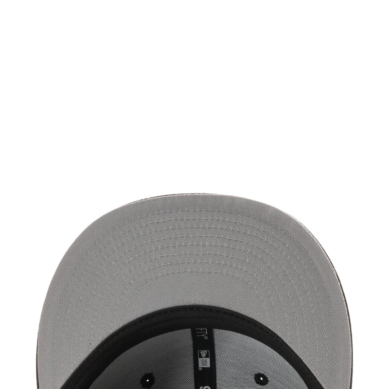 Gray 950 baseball cap underside with black inner band and brand label