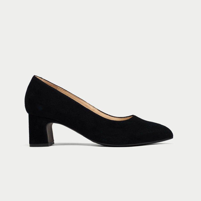 Black shoe on a light gray background