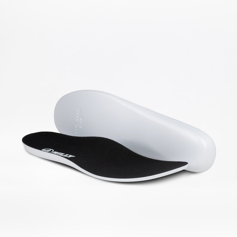 A pair of insoles for the Men's Taupe BILLY Inclusion Trail Boot by BILLY Footwear is pictured on a white background, with one insole flat and the other upright to show the black top and white bottom.