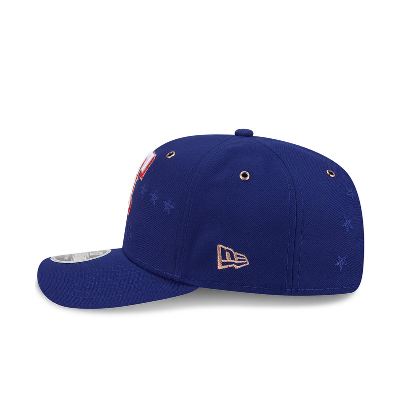 Blue baseball cap with New Era side logo patch, star pattern