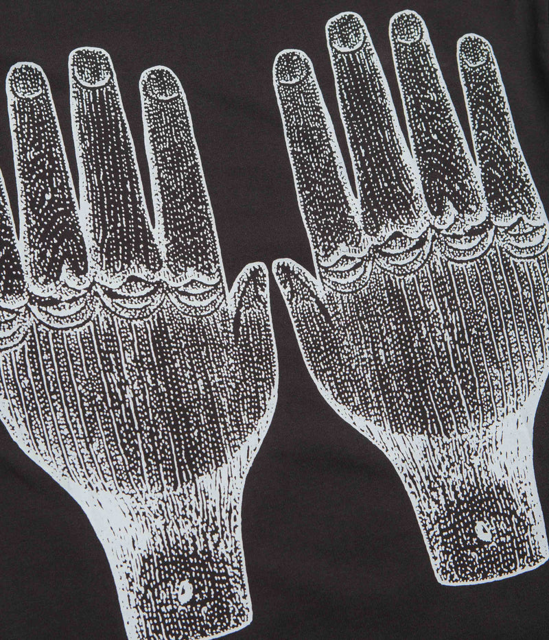 The Trilogy Tapes Face Figures Hands T-Shirt in Black