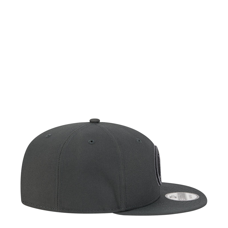 Dark gray baseball cap, side view with curved brim and stitched eyelets